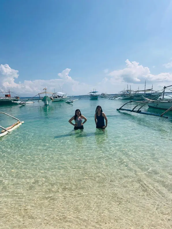 Embark on a thrilling island hopping adventure, cruising the crystal-clear waters of Bantayan.